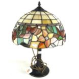 A 20th century Tiffany style table lamp with leaded glass shade.