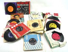 A collection of 45s record singles.