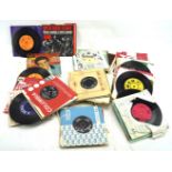 A collection of 45s record singles.