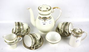 An Aynsley six setting coffee set. Including coffee pot, hot water jug, sugar bowl, creamer.