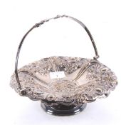 A silver plated basket stand by Walker and Hall.
