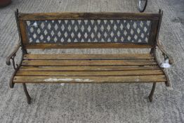 A garden bench. With metal effect wood back and metal end supports.