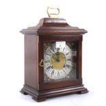 A 20th century stained wooden cased mantel clock by Eccles of Liverpool.