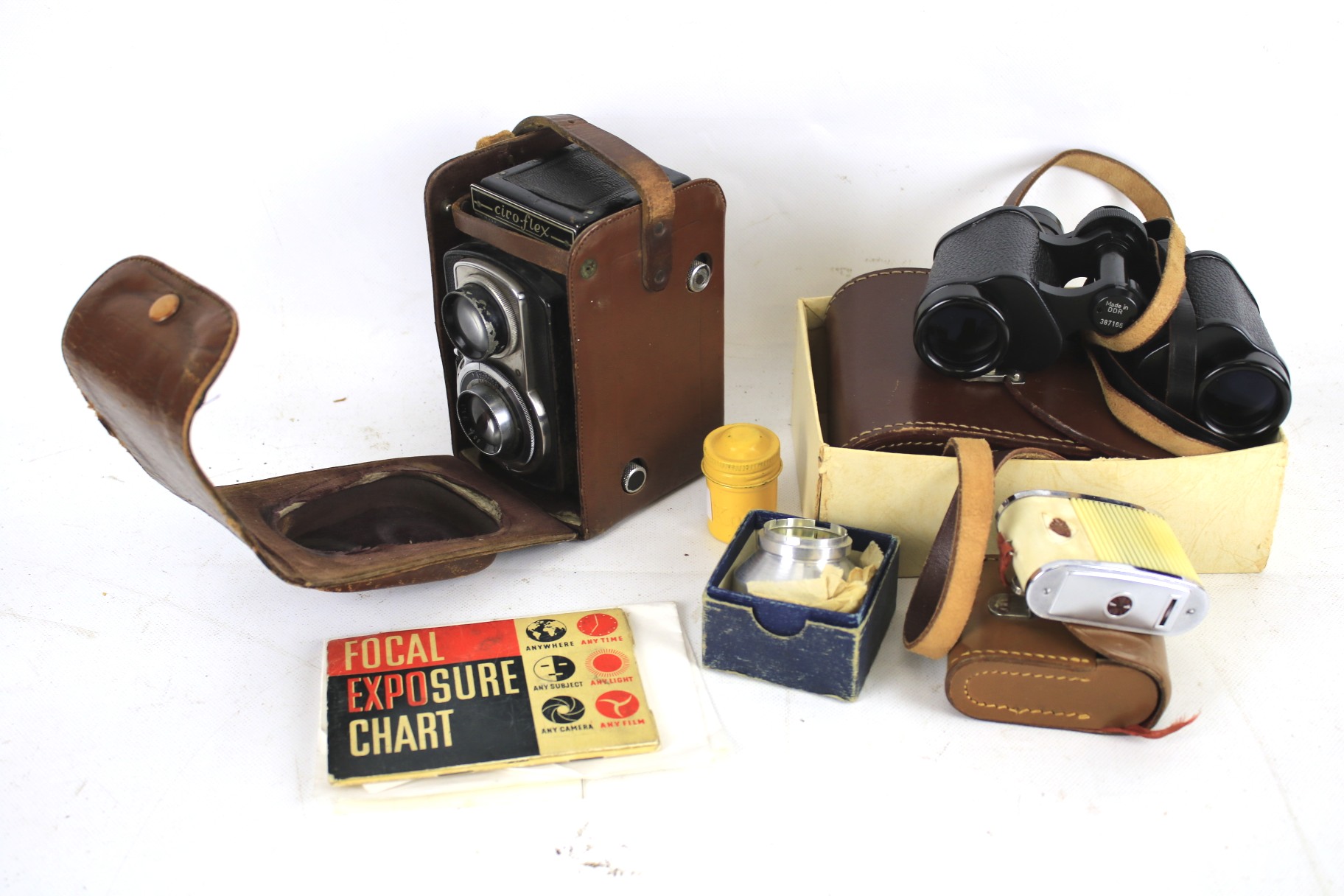Ciro Flex camera in case and a pair of Noctovist binoculars in original case, etc.