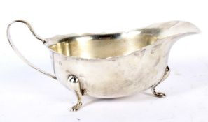 A George V silver sauce boat.