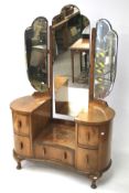 A mid-century Art Deco style burr walnut dressing table.