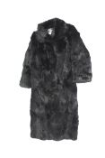 A ladies vintage black full length fur coat size 38.