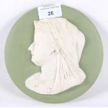 A 19th century ceramic plaque depicting Queen Victoria. Of circular form, measuring 16.