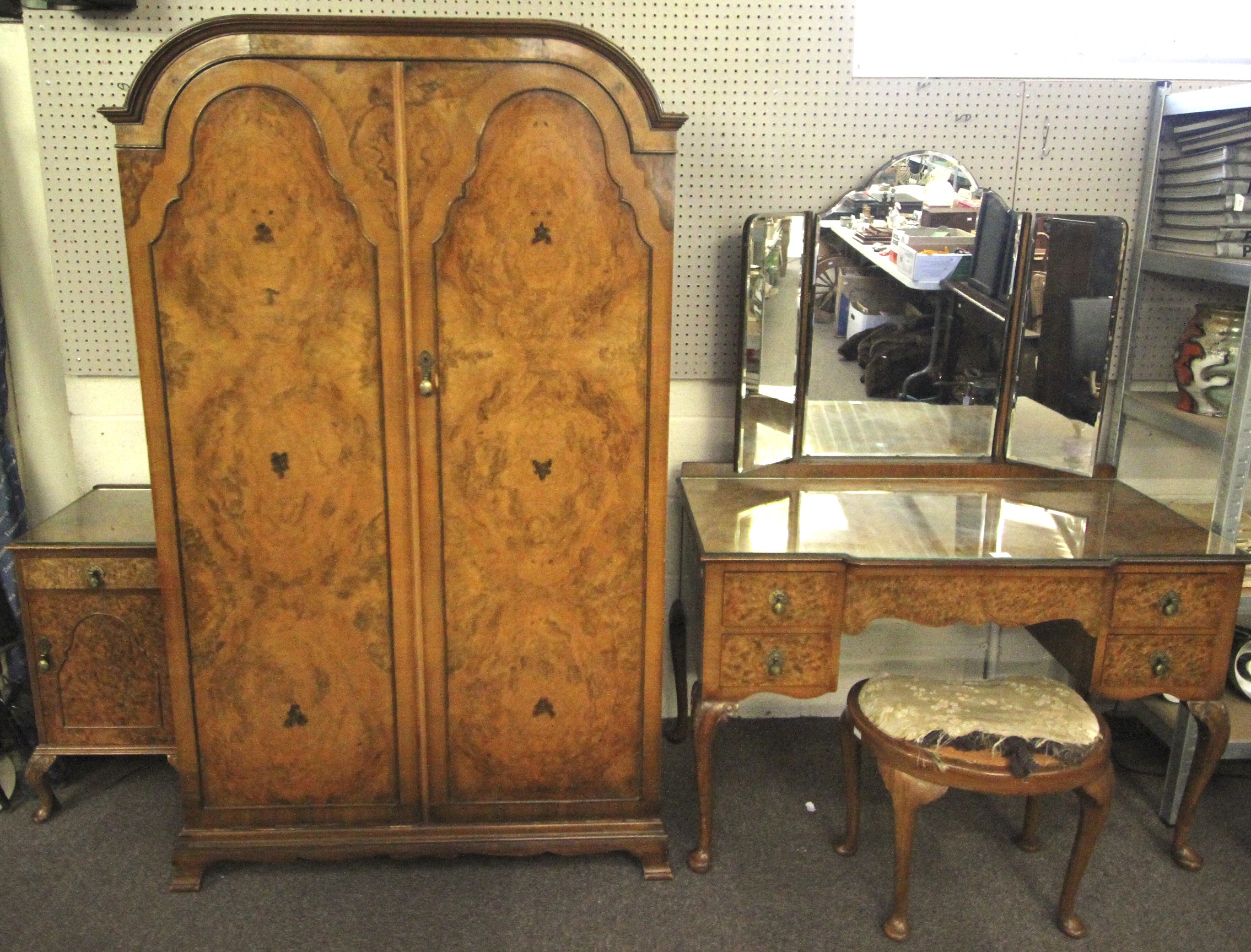 An Art Deco three piece burr walnut bedroom suite.