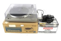 A Panasonic Sl-H302 record player and a Tamashi 35mm camera. Both boxed.