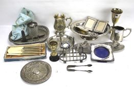 An assortment of silver plate and silver.
