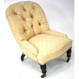 A Victorian small button back nursing chair.