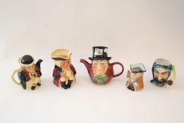 A collection of ceramic Toby and character jugs.