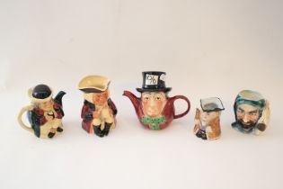 A collection of ceramic Toby and character jugs.