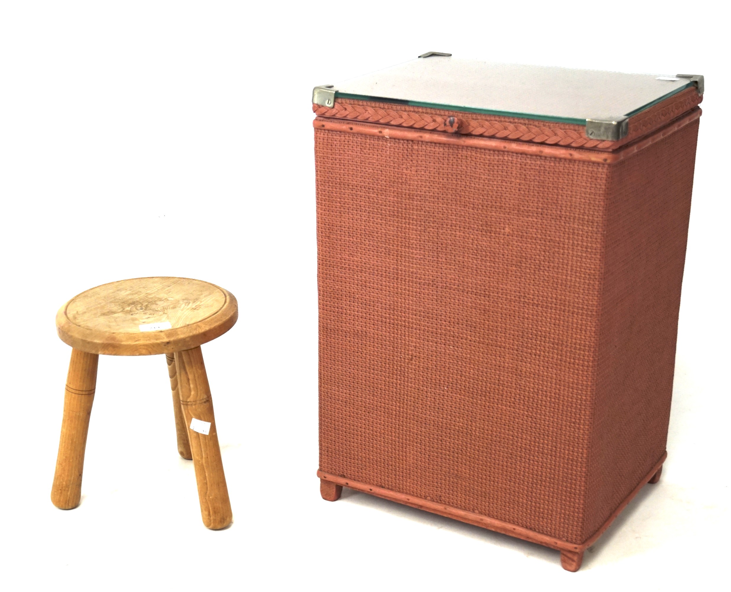 An elm turned stool and a Lloyd Loom style basket adapted into a table.