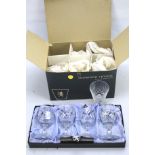 Two sets of Edinburgh Crystal drinking glasses.