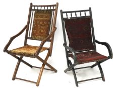 Two late 19th century folding steamer chairs. One stained black, both with woven seats and backs.