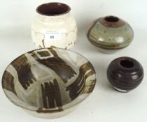 Four 20th century studio pottery vases/bowls. One signed to underside,.