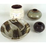 Four 20th century studio pottery vases/bowls. One signed to underside,.