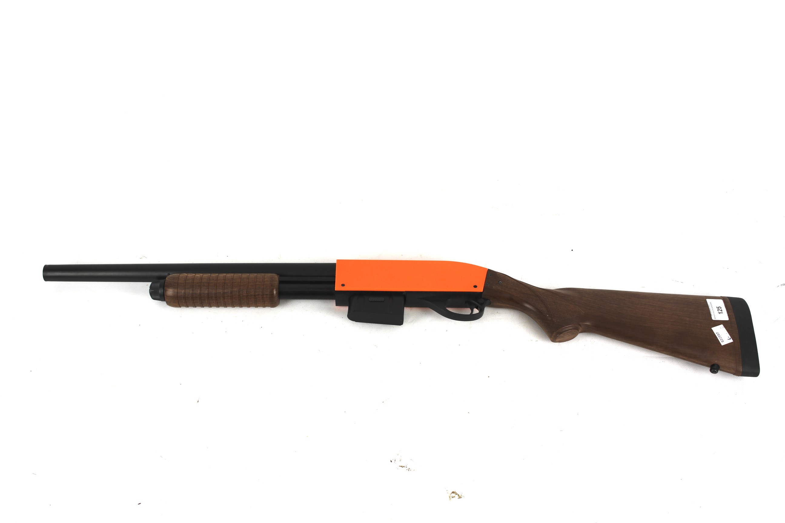 A plastic BB gun with orange sleeve,