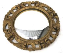 A 20th century gilt wood framed convex mirror.