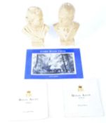 Two cast busts of Queen Elizabeth II and the Duke of Edinburgh, and programmes.