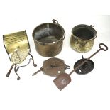 An assortment of metalware including pans, boot scraper, trivet,