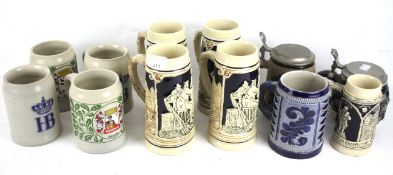 Eleven assorted steins/flagons. Various sizes and makes including West German.