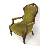 A 19th century mahogany buttonback armchair.