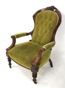 A 19th century mahogany buttonback armchair.