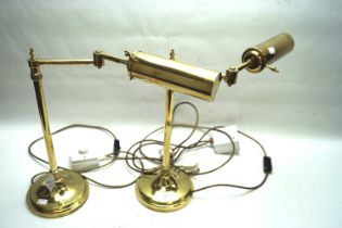 A pair of adjustable desk lamps.