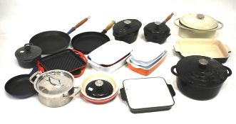 An extensive assortment of Le Cruset and Berndes oven to table ware.