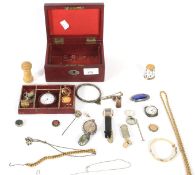 A jewellery box with an assortment of jewellery.