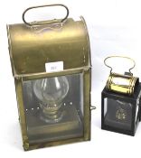A Sherwoods hand held brass carriage lantern and a similar 19th century lantern. H31.