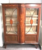 An inlaid mahogany astragal glazed display cabinet.
