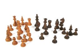 An early 20th century carved wooden chess set.