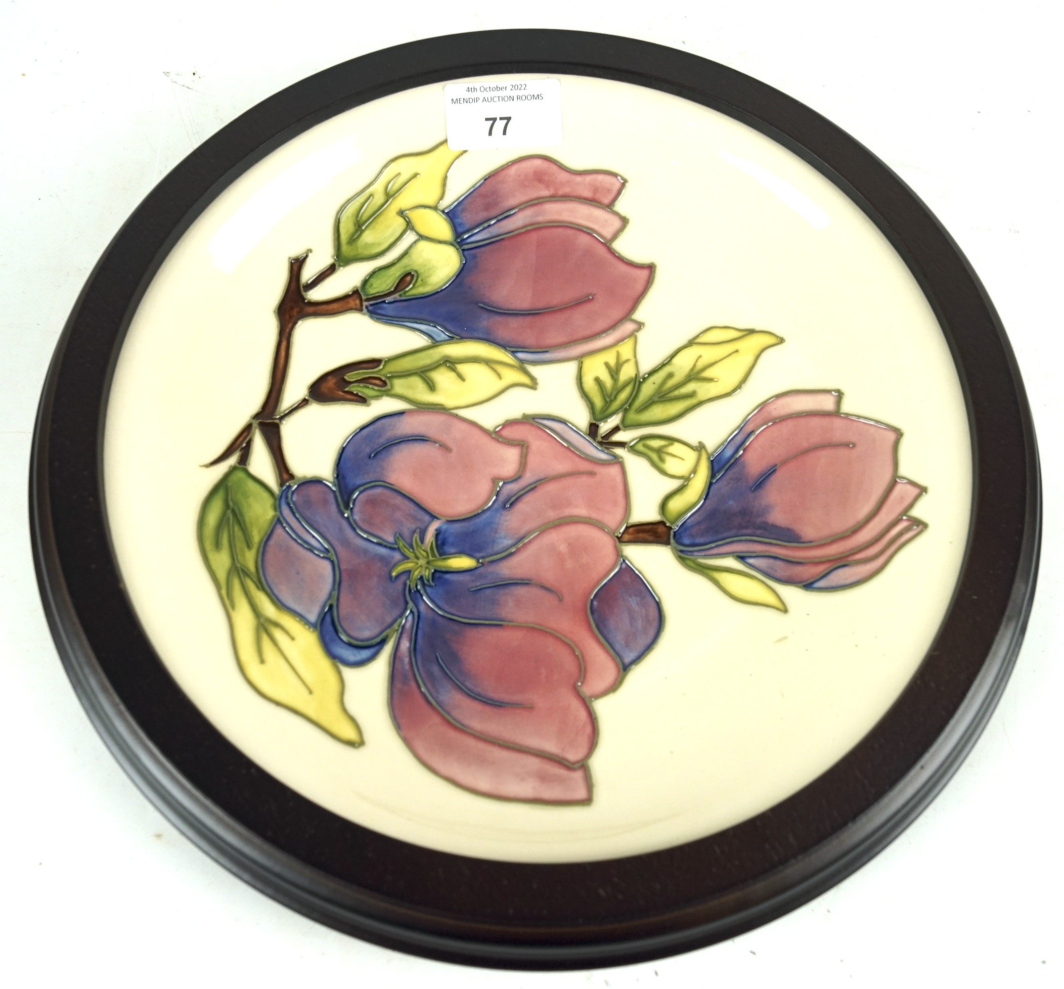 A contemporary limited edition Moorcroft wall plate.