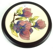 A contemporary limited edition Moorcroft wall plate.