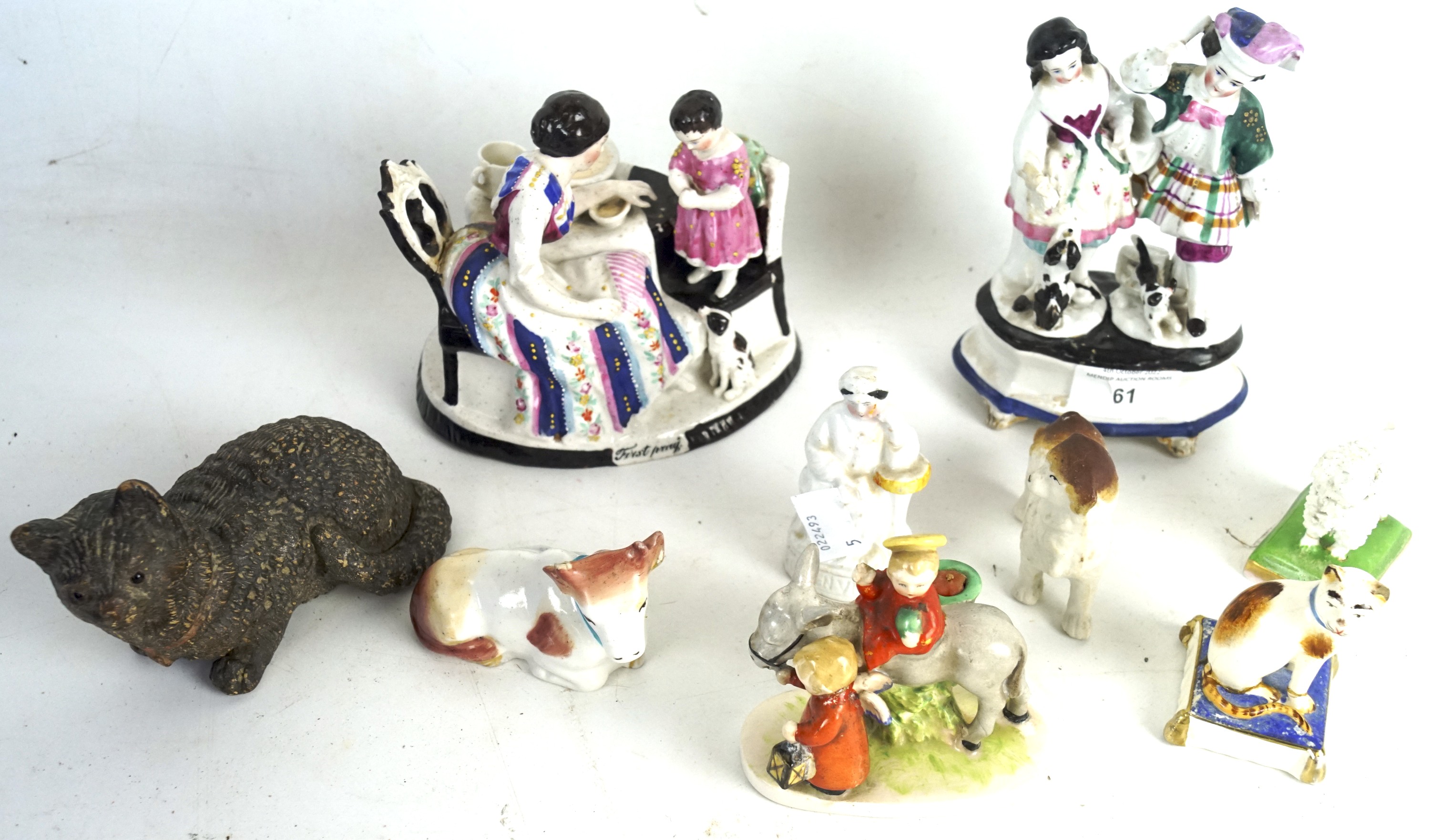 A collection of ceramic figures, 19th century and later.
