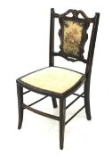 A small, Edwardian mahogany chair. WIth inlaid detailing, upholstered back and seat.