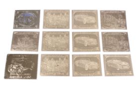 Twelve stamps of the world 'gold' replica stamps.