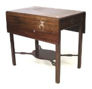 A late 19th century mahogany drop leaf table.