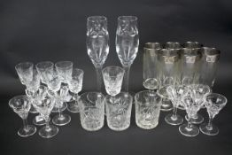 An assortment of crystal glasses, including Edinburgh Stuart liqueur glasses, tumblers,