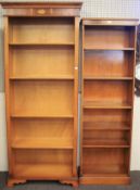 Two modern book shelves with adjustable shelves.