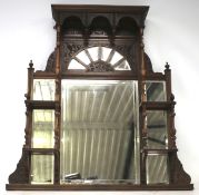 An early 20th century mahogany overmantel mirror.