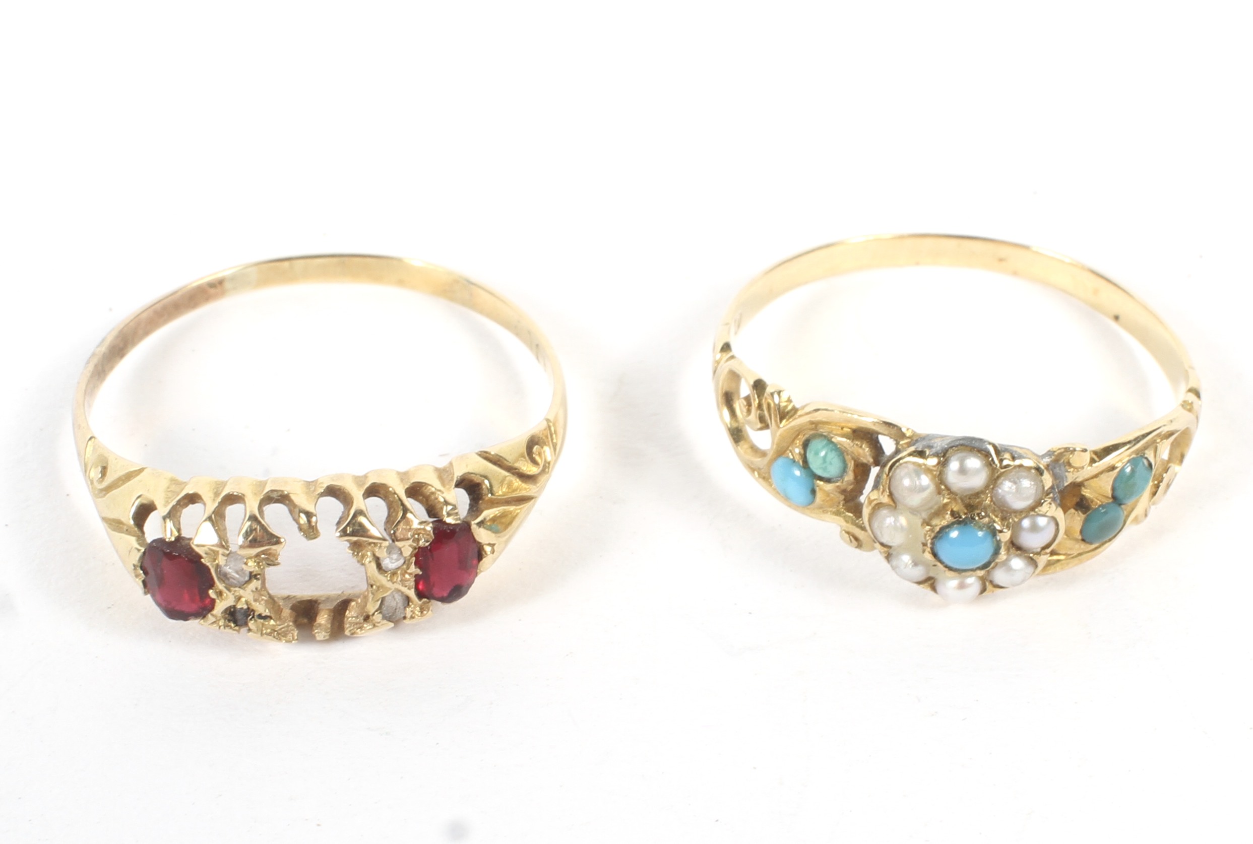 Two rings. An 18ct gold ring with two rubies, indistinct mark, weight 1.