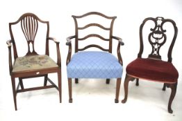 Three 19th century mahogany chairs. Including two elbow chairs and another with ornate pierced back.