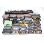 A large collection of mostly boxed diecast model vehicles.