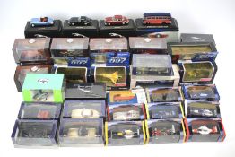 A large collection of mostly boxed diecast model vehicles.