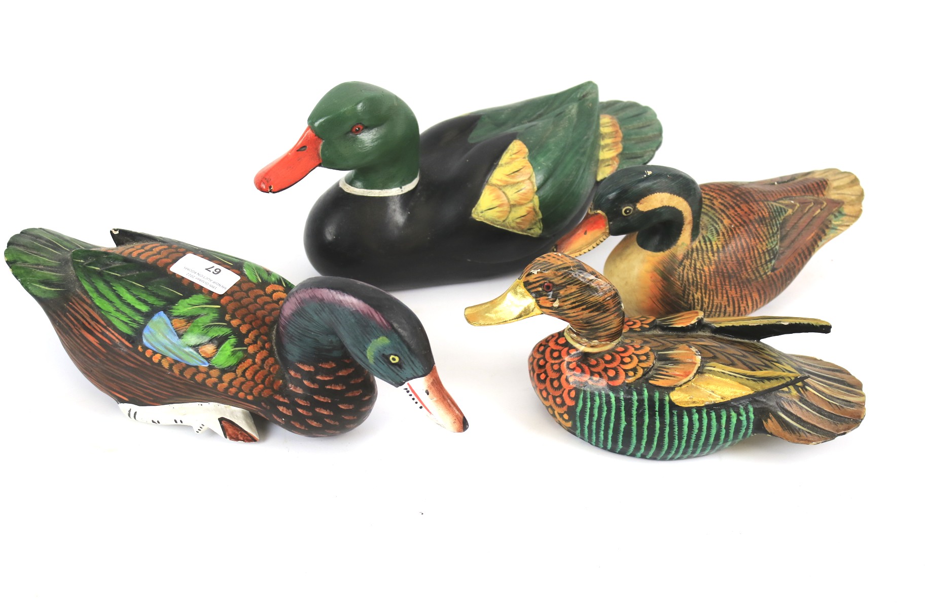 Four 20th century painted wooden ducks.